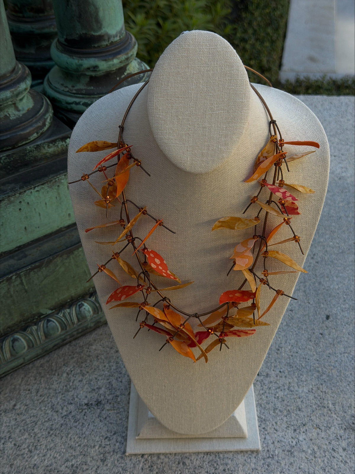 “Fall Flutter” — Orange/Gold Batik Leaves by Isabelle Tourneau